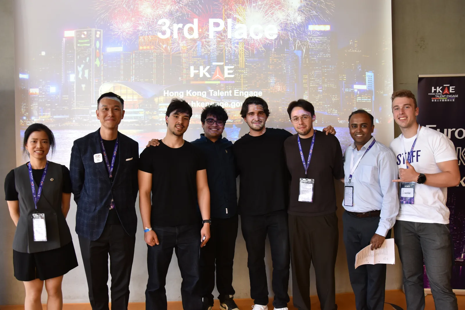 The team on stage in front of a screen reading 3rd Place at the EuroTech Hong Kong Hackathon