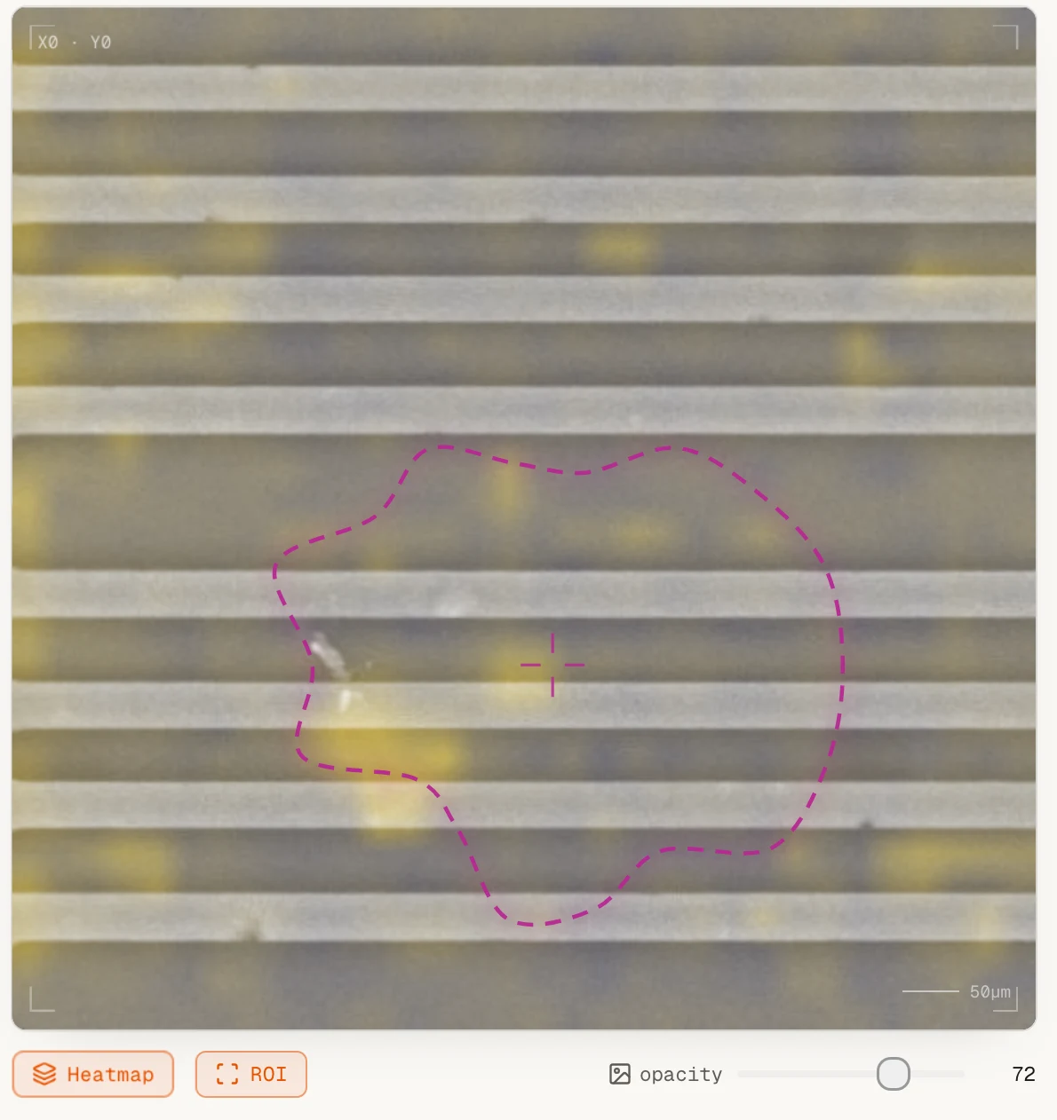 The workbench showing a wafer micrograph with a defect heatmap overlay and a dashed region-of-interest outline